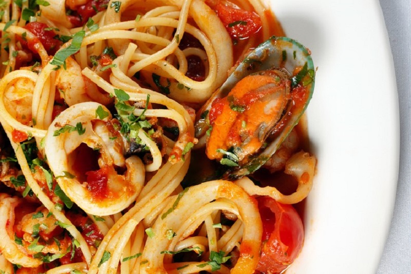 spinach stuffed mussels & shrimp with cilantro as garnish. healthy pasta recipes